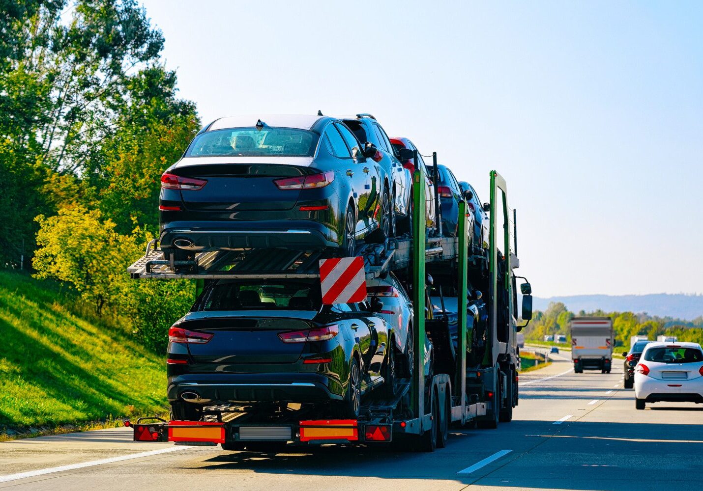 Cars,Carrier,Truck,At,The,Asphalt,Road,,Poland.,Truck,Transporter